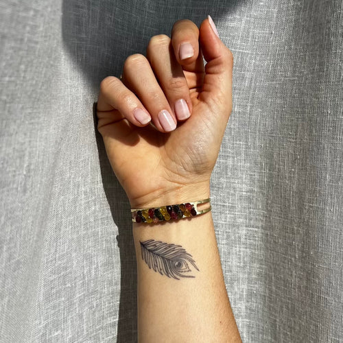 Pluma de pavo real