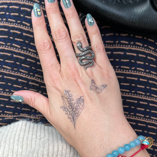 Tatuaje del lirio de los valles