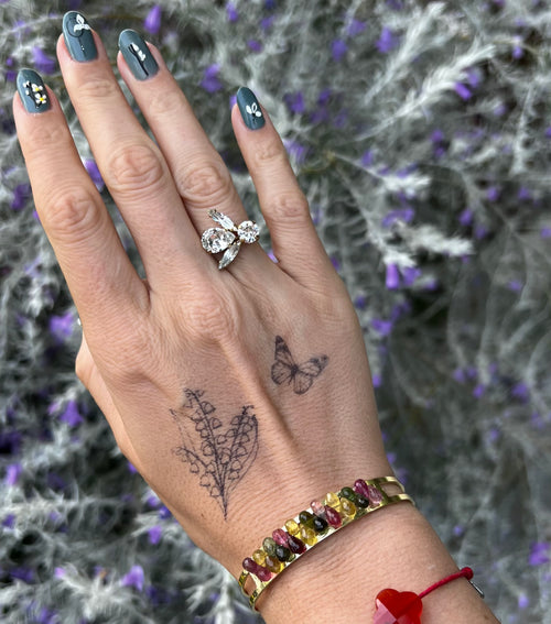 Tatuaje del lirio de los valles