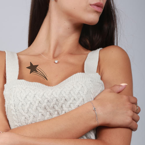 Tatouage étoile filante pour femme dans le cou idée tattoo éphémère