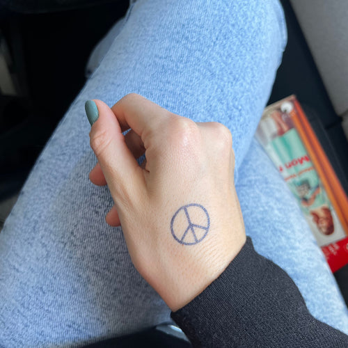 Tatuaje de paz y amor